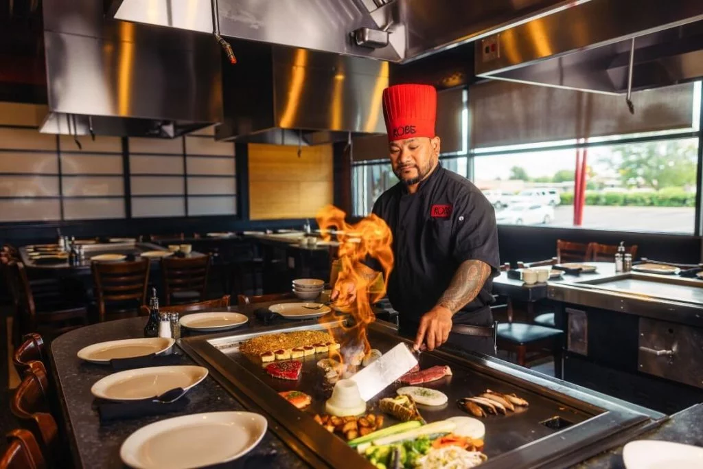 Kobe Japanese Steakhouse hibachi chef cooking at the teppanyaki grill